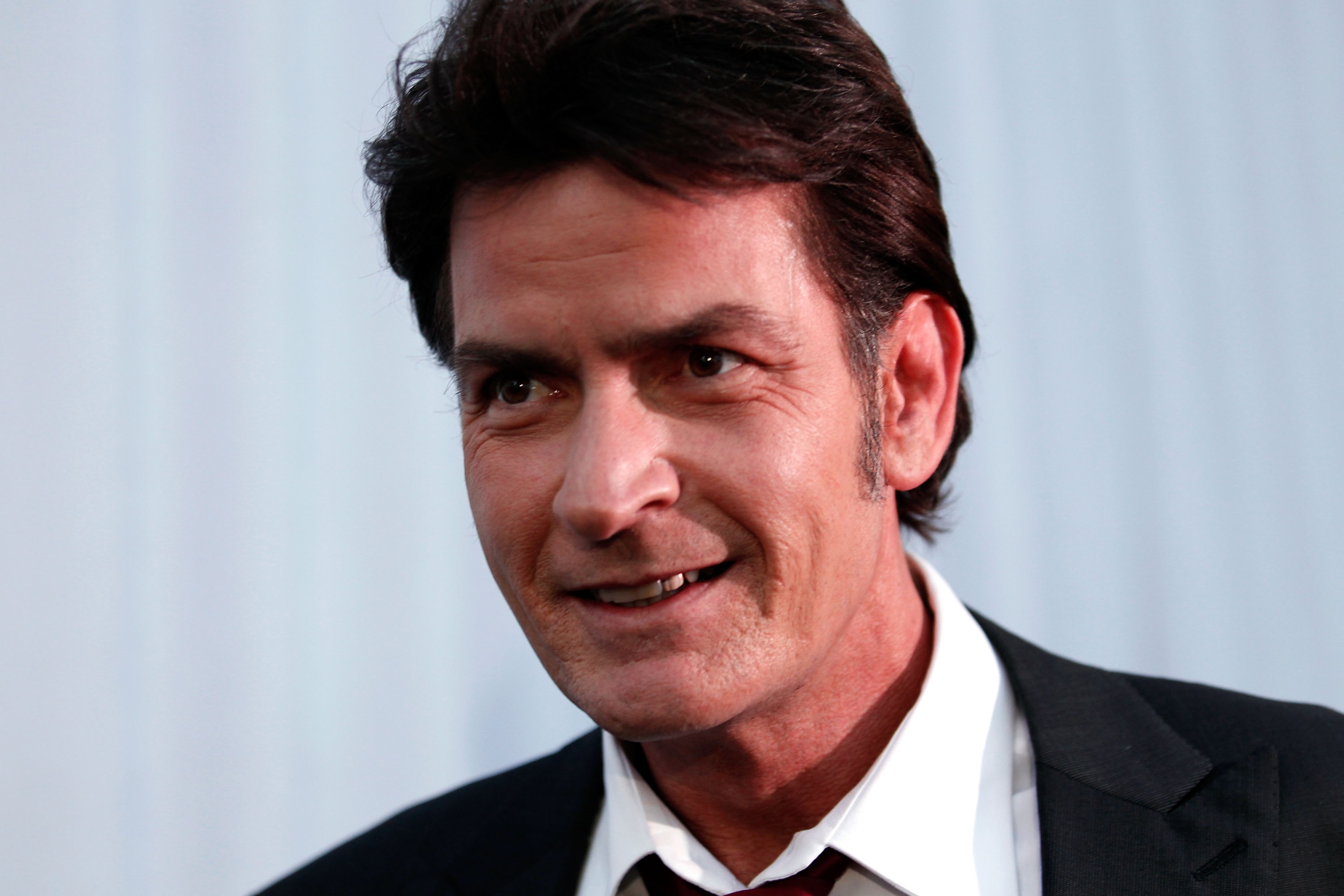 Charlie Sheen battles exes over twins' bad behavior