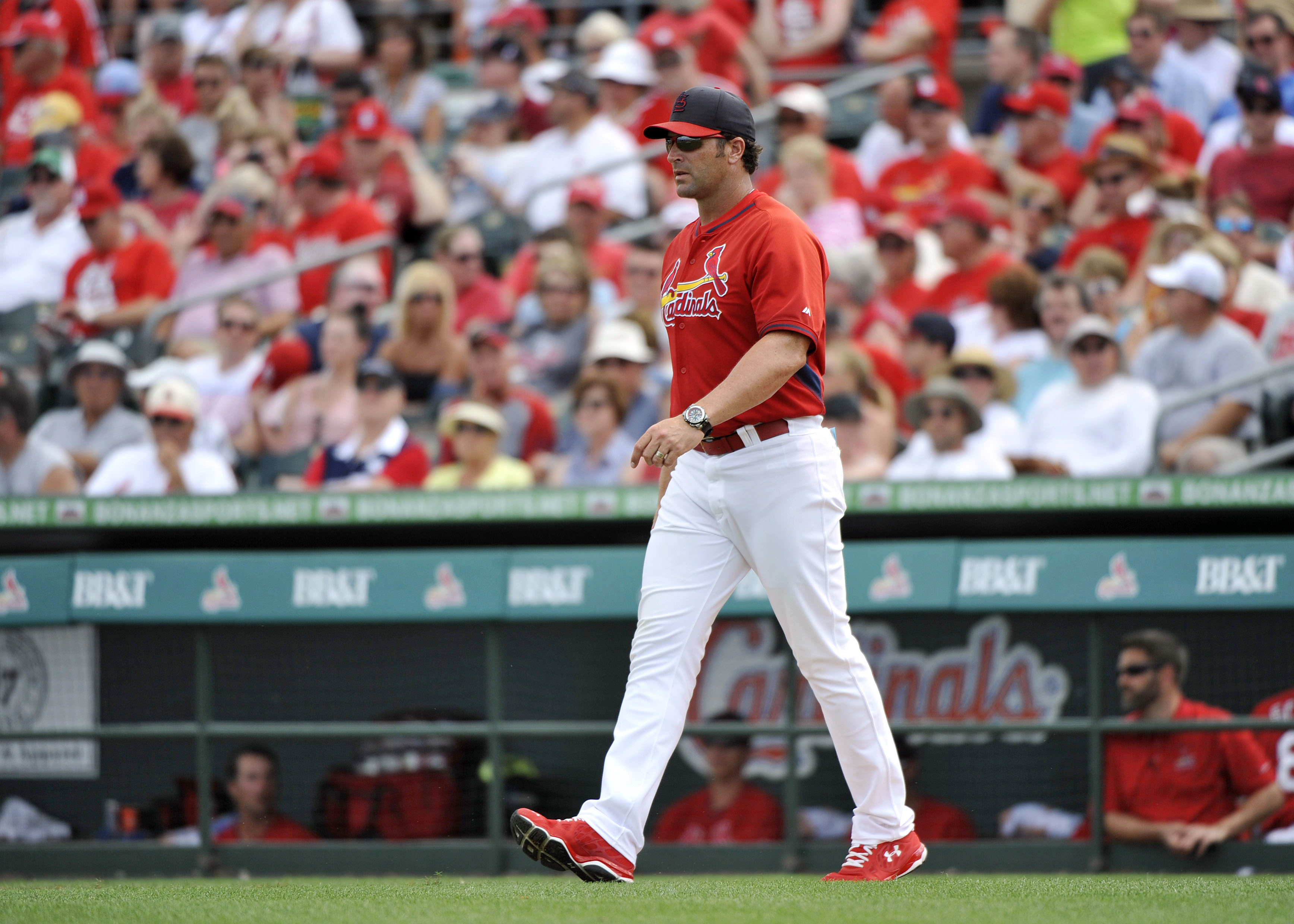 Joe Kelly, suspended Boston Red Sox pitcher, watches from bleachers