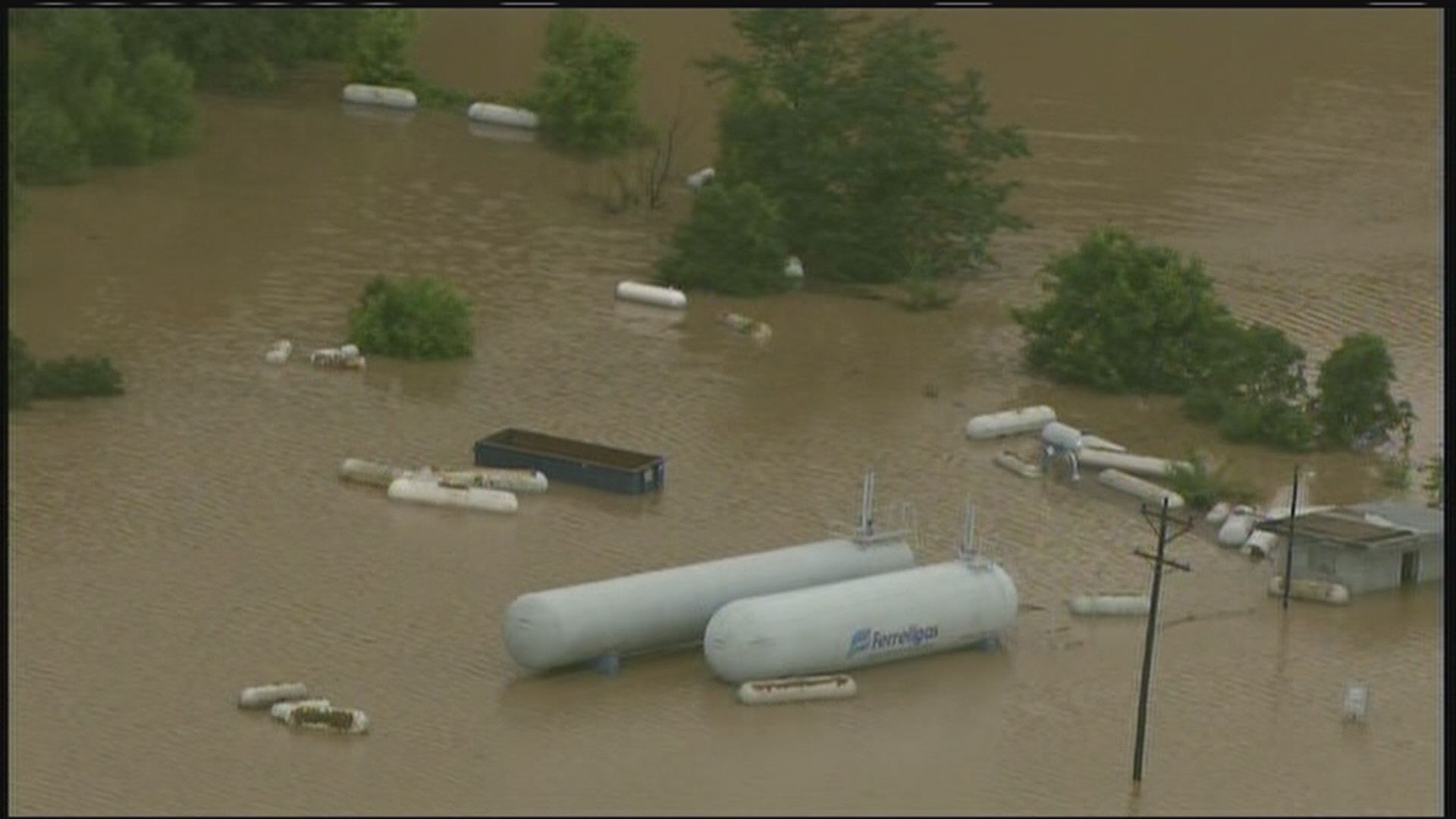 Propane tanks float from gas plant due to flooding