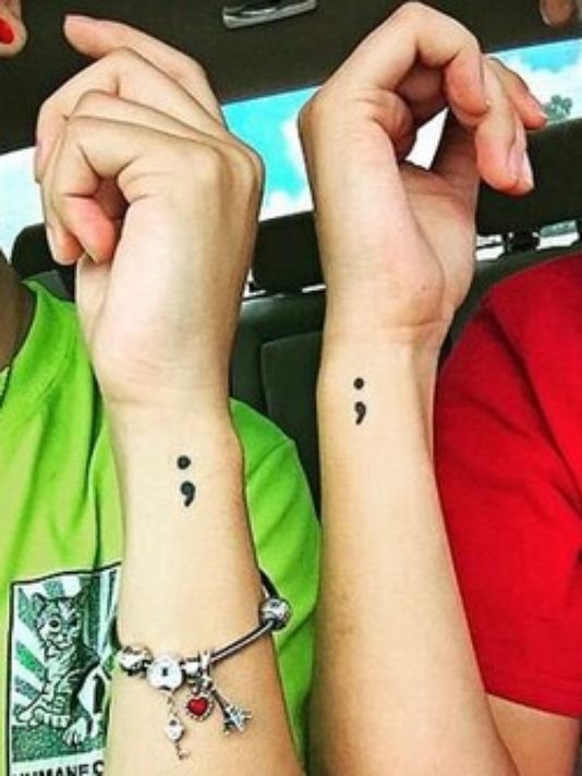 Semicolon tattoos raise awareness about mental illness 