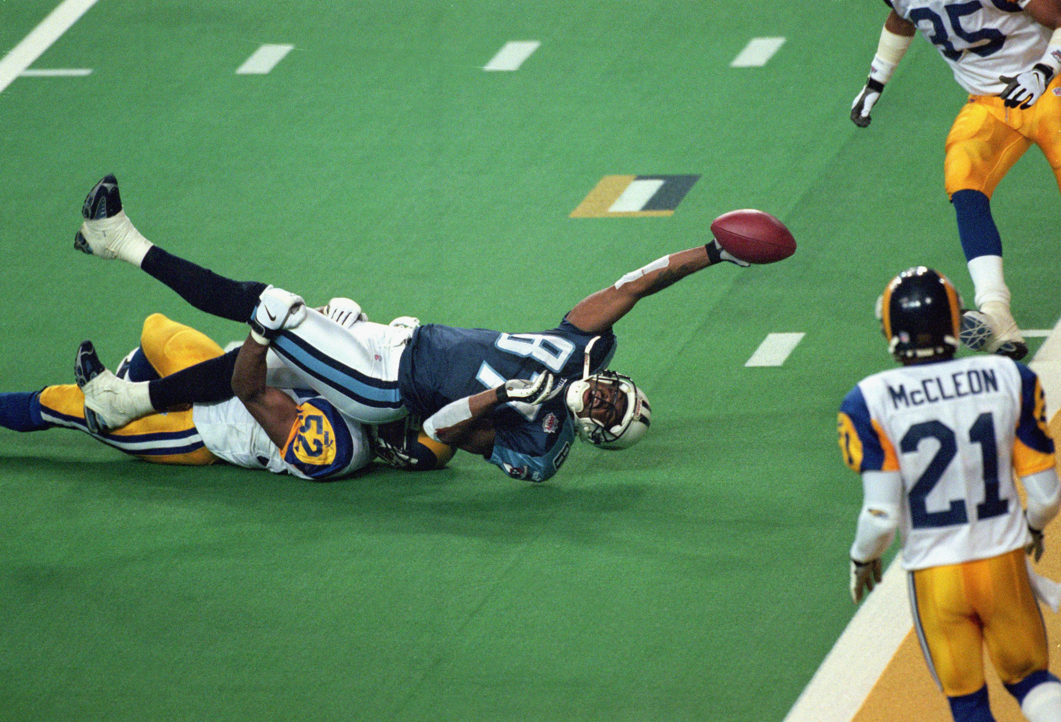 Marshall Faulk of the St. Louis Rams runs with the ball during the News  Photo - Getty Images