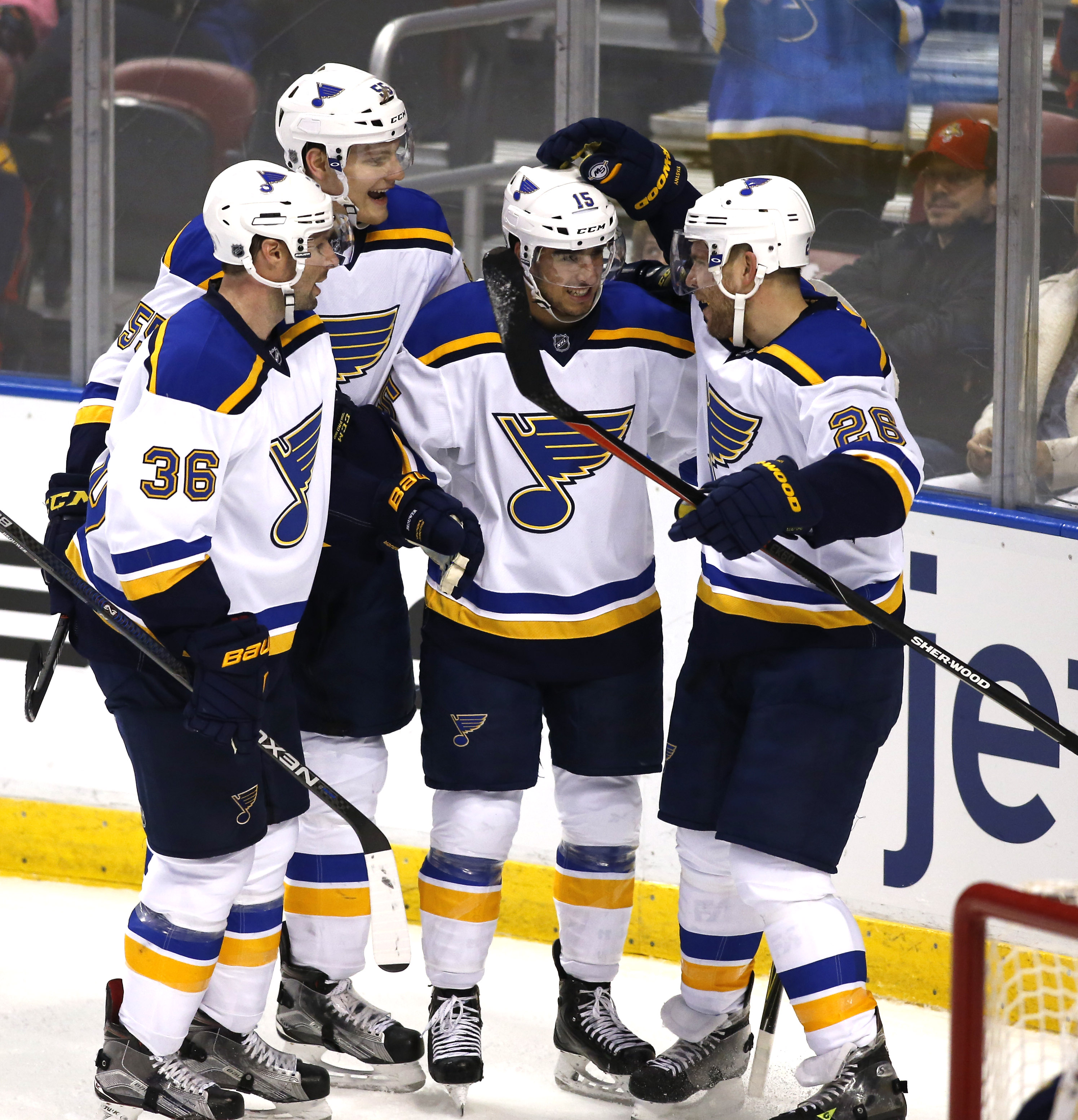 Paul Cavallini and Brett Hull of the St. Louis Blues look on prior