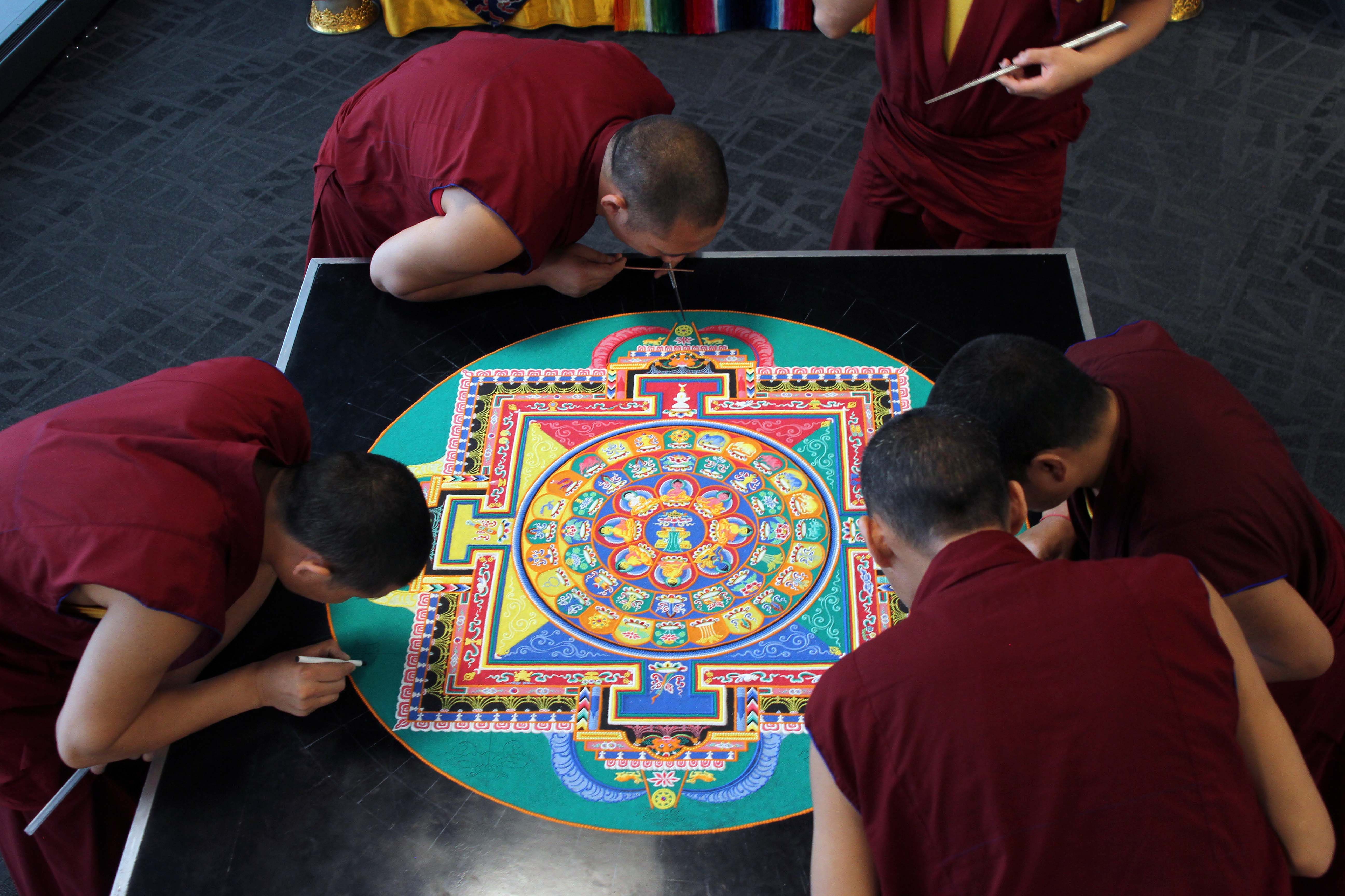 PHOTOS: Tibetan Monks create sand painting | 9news.com