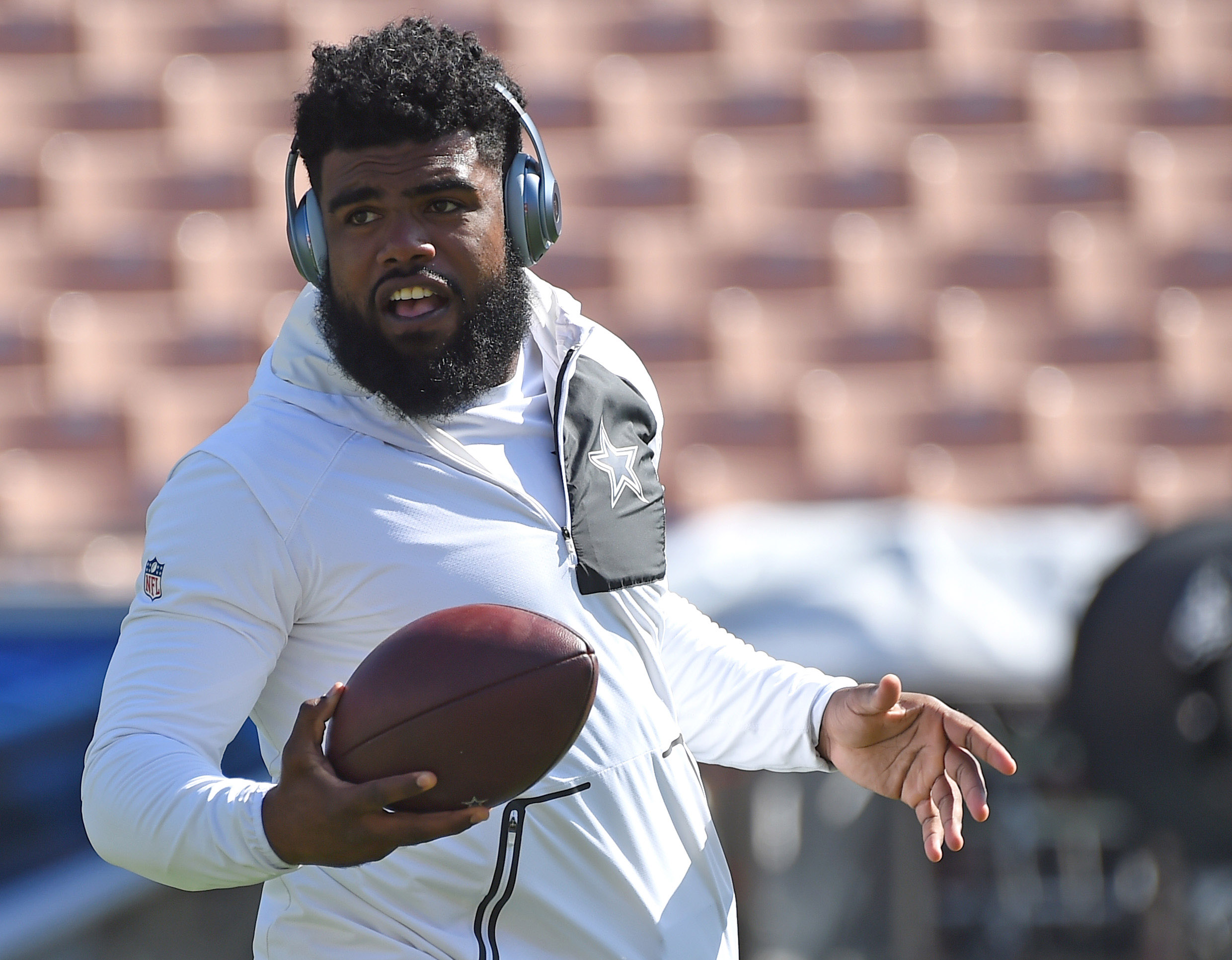 Ezekiel Elliott of the Dallas Cowboys warms up on the field prior to