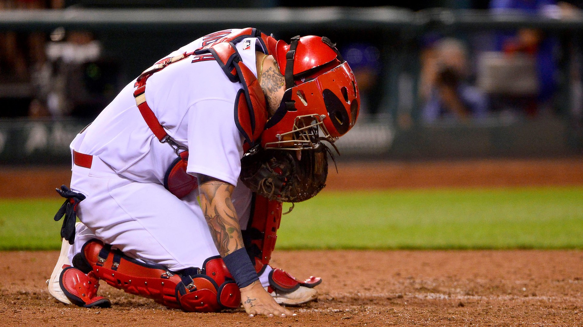 Download Yadier Molina reacts to a home run hit by his St. Louis